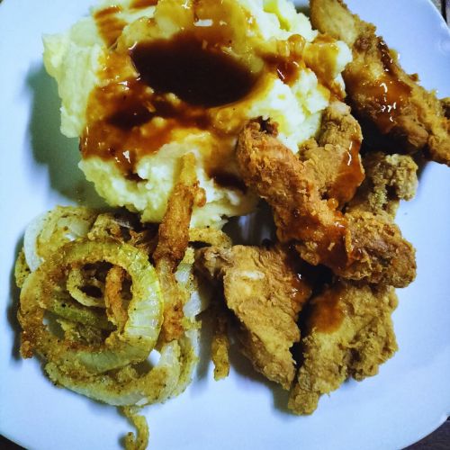 crispy chicken strips, mashed potatoes, onion rings, homemade recipe, family dinner, comfort food, easy cooking, golden perfection, crispy coating, delicious meal