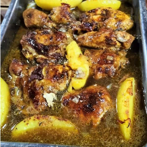 grilled chicken, potatoes, BBQ-style, outdoor feast, summer recipe, herb-infused, easy grilling, family barbecue, flavorful meal, backyard cooking