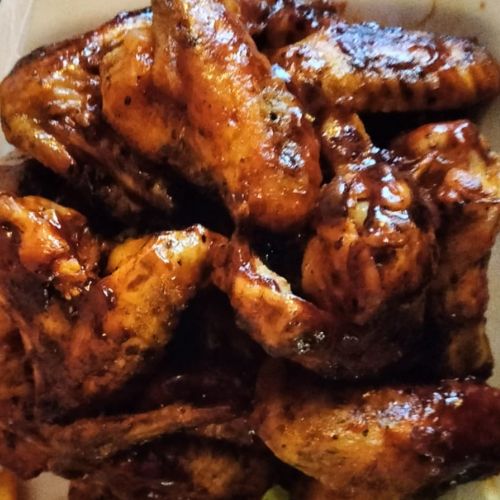 sticky chicken wings, sweet and savory, game night recipe, finger-licking good, party appetizer, crowd-pleaser, flavorful glaze, easy snack, sticky goodness, appetizer perfection