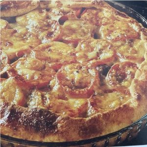 cheese and tomato quiche, savory delight, classic recipe, buttery crust, creamy filling, blend of cheeses, juicy tomatoes, satisfying meal, brunch or dinner, irresistible quiche